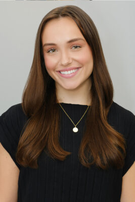 Professional female headshot with natural light — personal branding