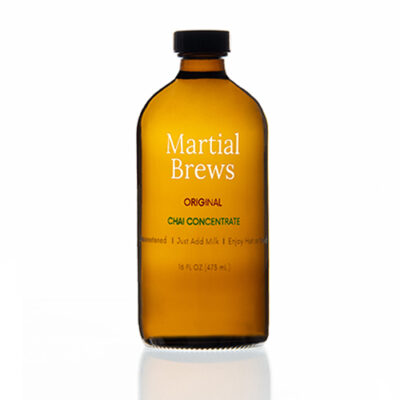 Amber skincare bottle on white background — beauty product photography NYC by 1984 Studio